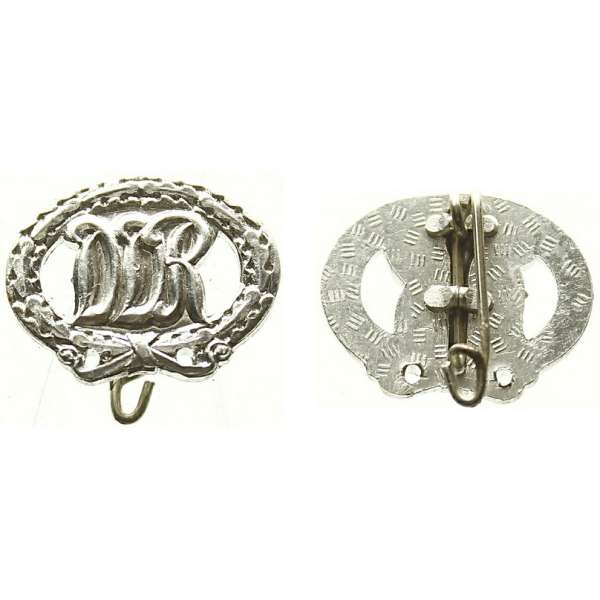 ODZNAK DDR ČEPICOVÝ 20x16mm ALU STŘÍBRNÝ