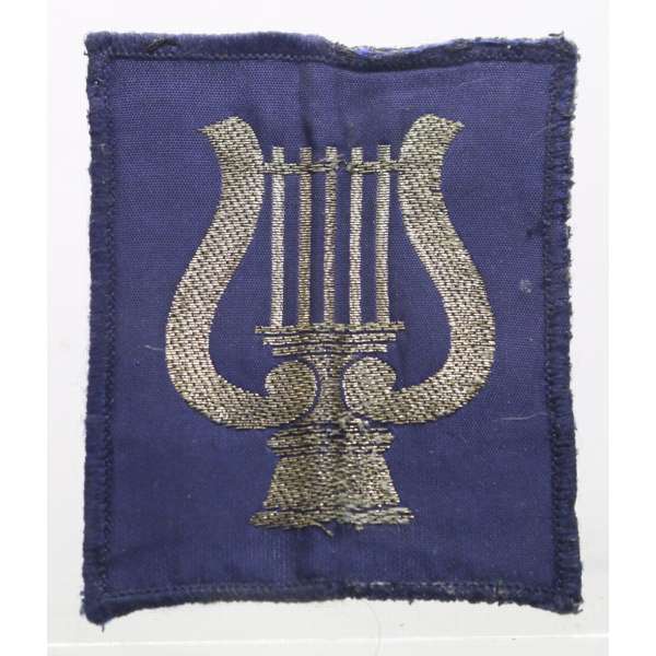 NÁŠIVKA BRIT 4R CORPS OF ARMY MISIC REGIMENT 55x65mm orig MODRO-ZLATÁ